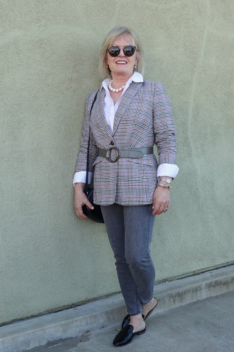 Jennifer Connolly of A Well Styled Life wearing a long blazer and jeans from Talbots