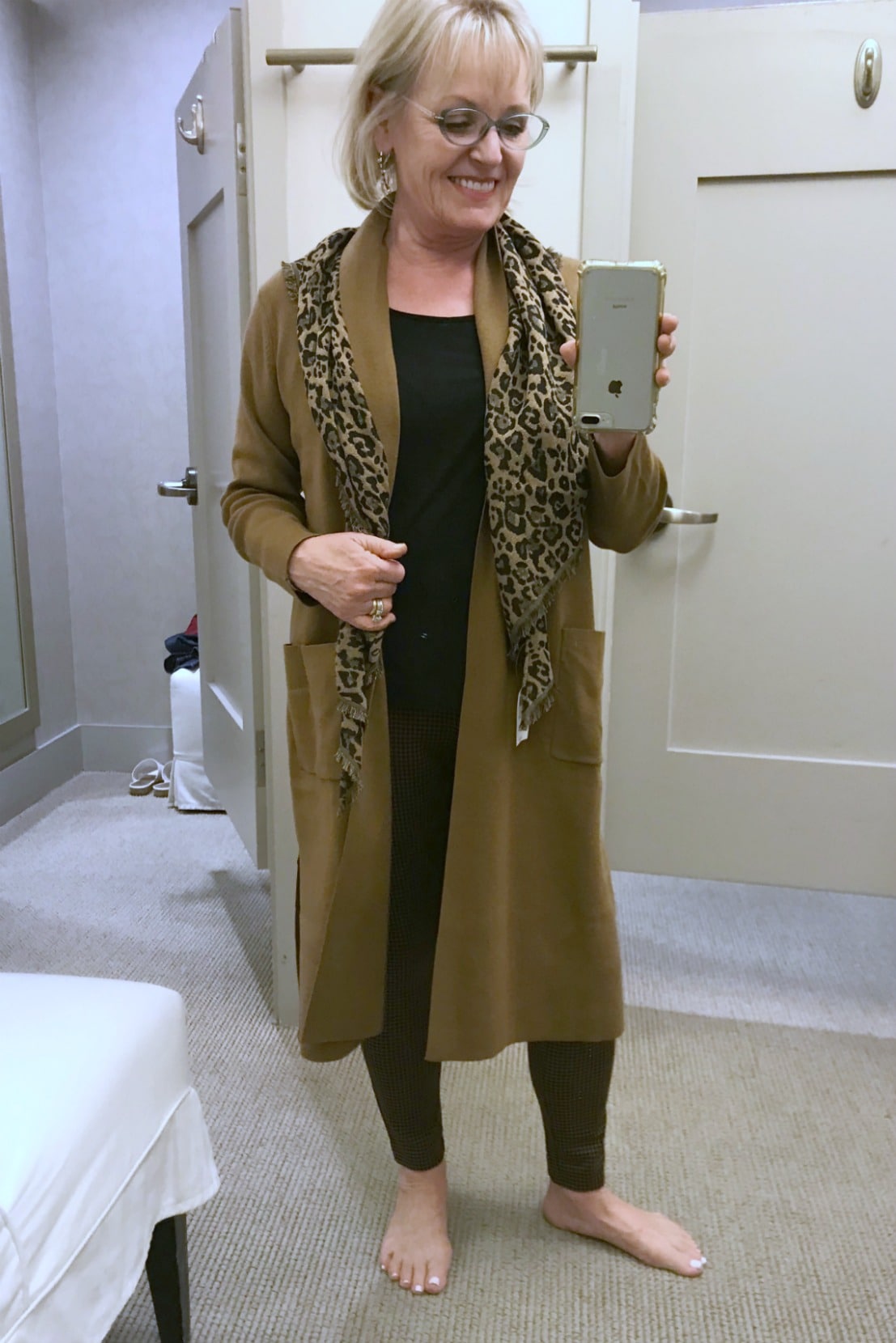 Jennifer Connolly of A Well Styled life wearing j.jill sweater and scarf in changing room at j.jill