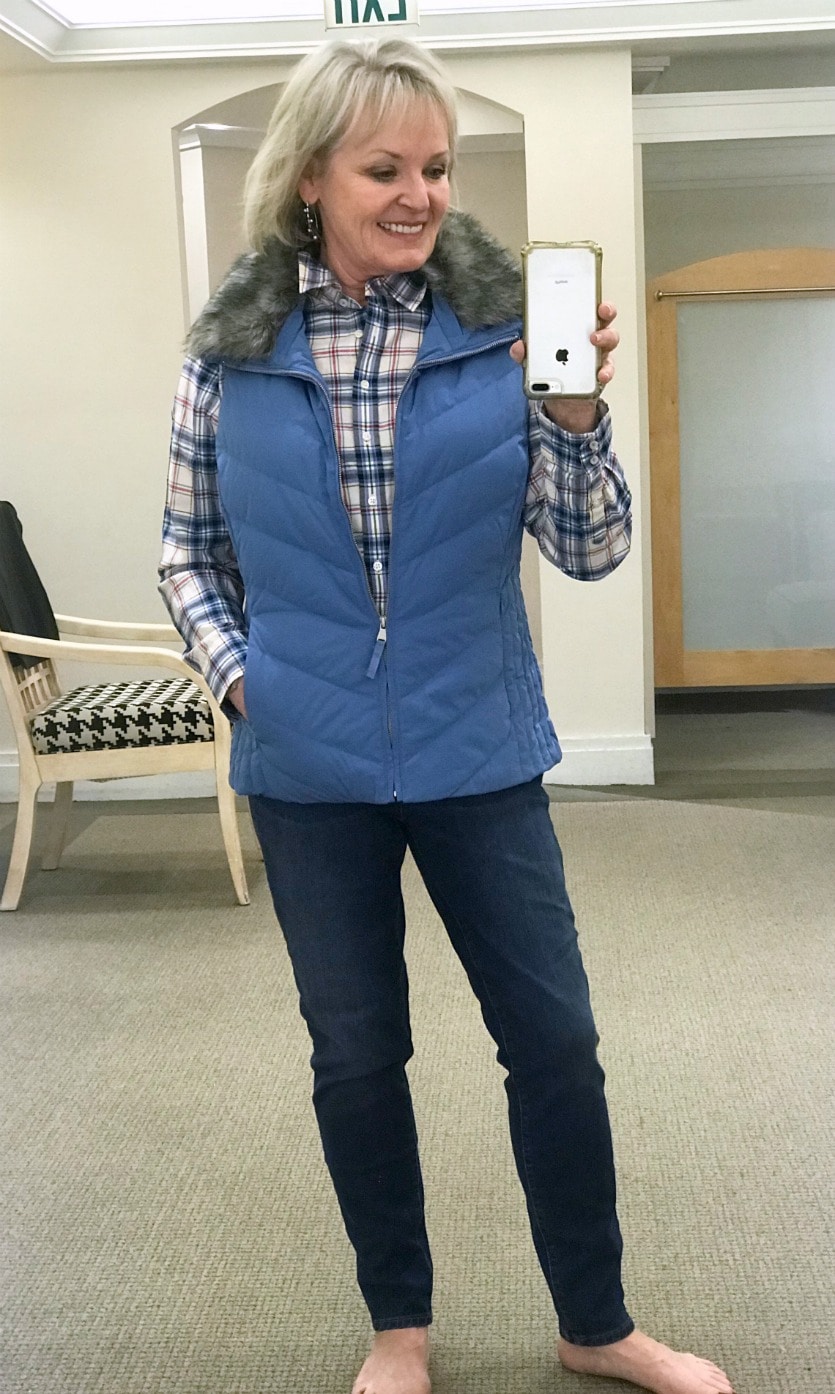 Jennifer Connolly wearing blue puffer vest, plaid shirt and blue jeans from Talbots