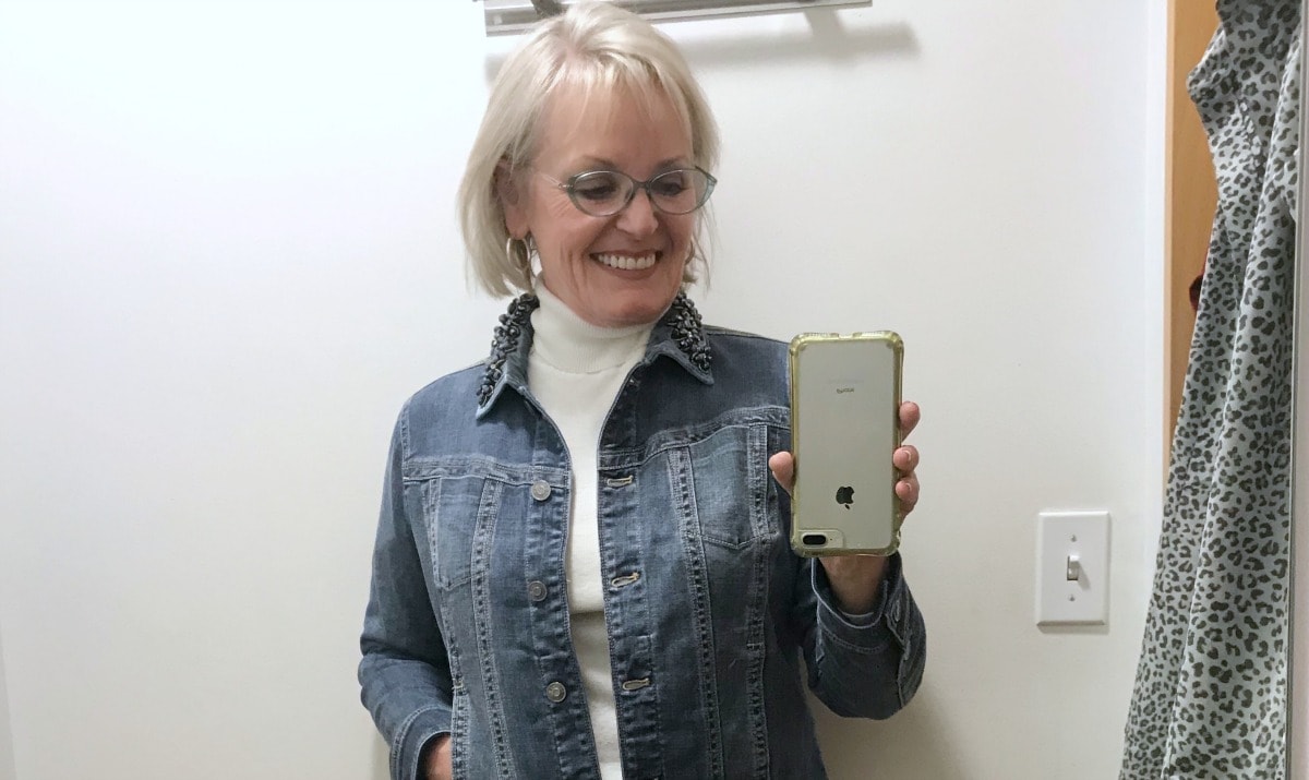 Jennifer Connolly in Chico's dressing room styling denim jacket with embellished collar