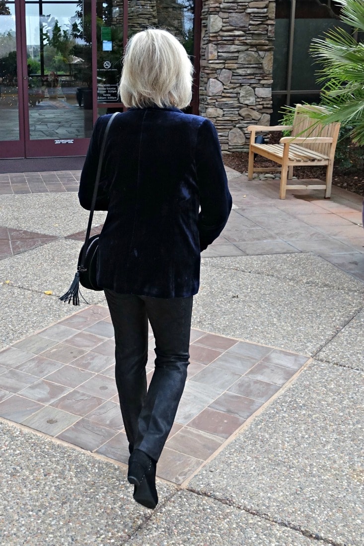 Jennifer Connolly of A Well Styled life wearing blue velvet jacket with faux leather pants