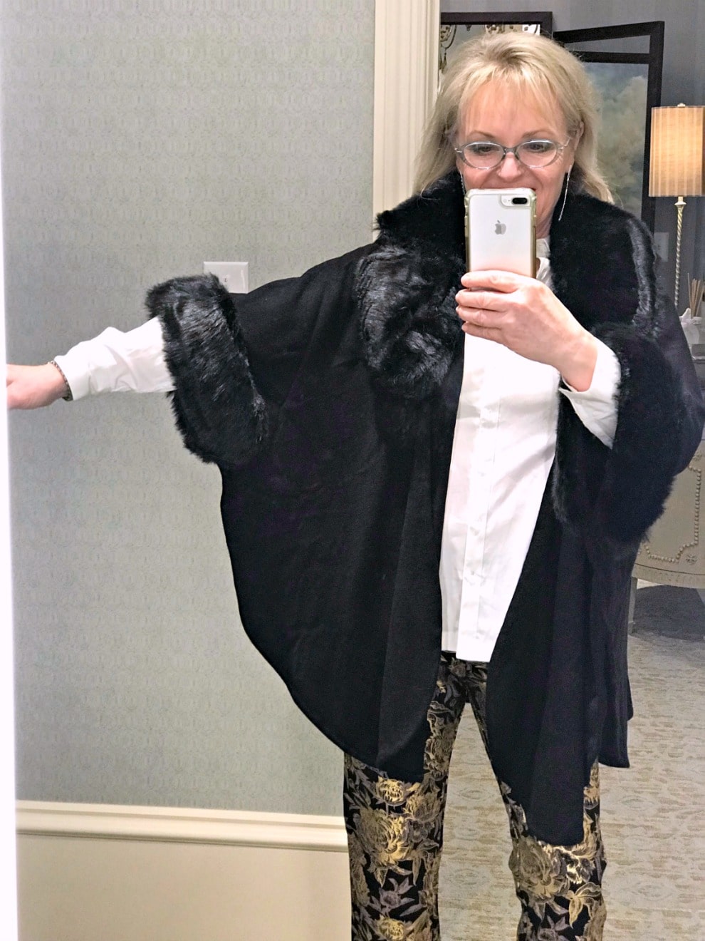 Fabienne Capelet on Jennifer Connolly with white shirt and gold pattern pants