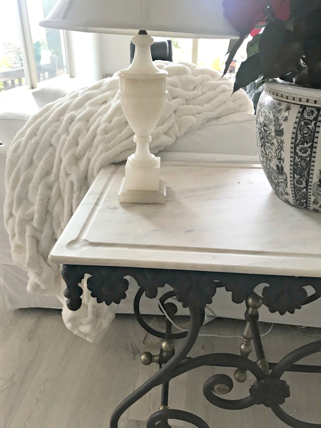 La Parisienne Faux Fur Throw over back of couch