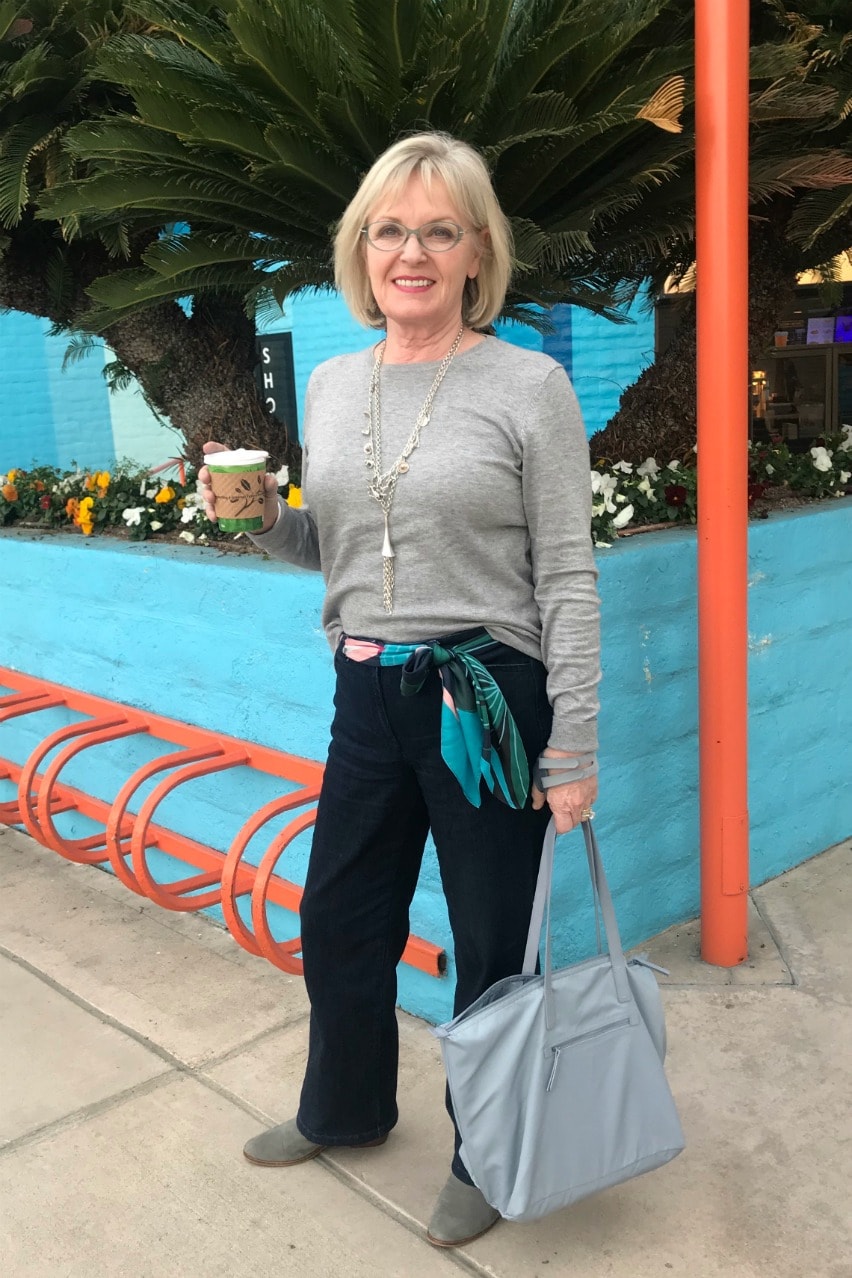 Jennifer Connolly of A Well Styled Lifdark jeans ans carf as belt