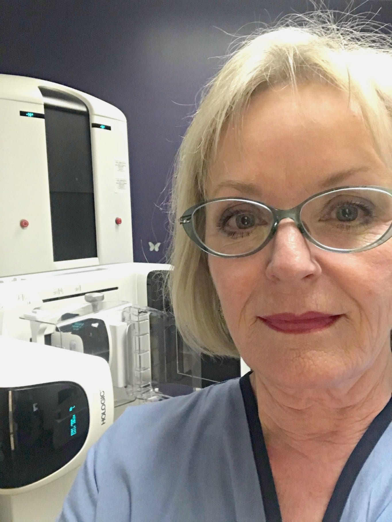 Jennifer Connolly of A Well Styled Life in front of mammogram machine