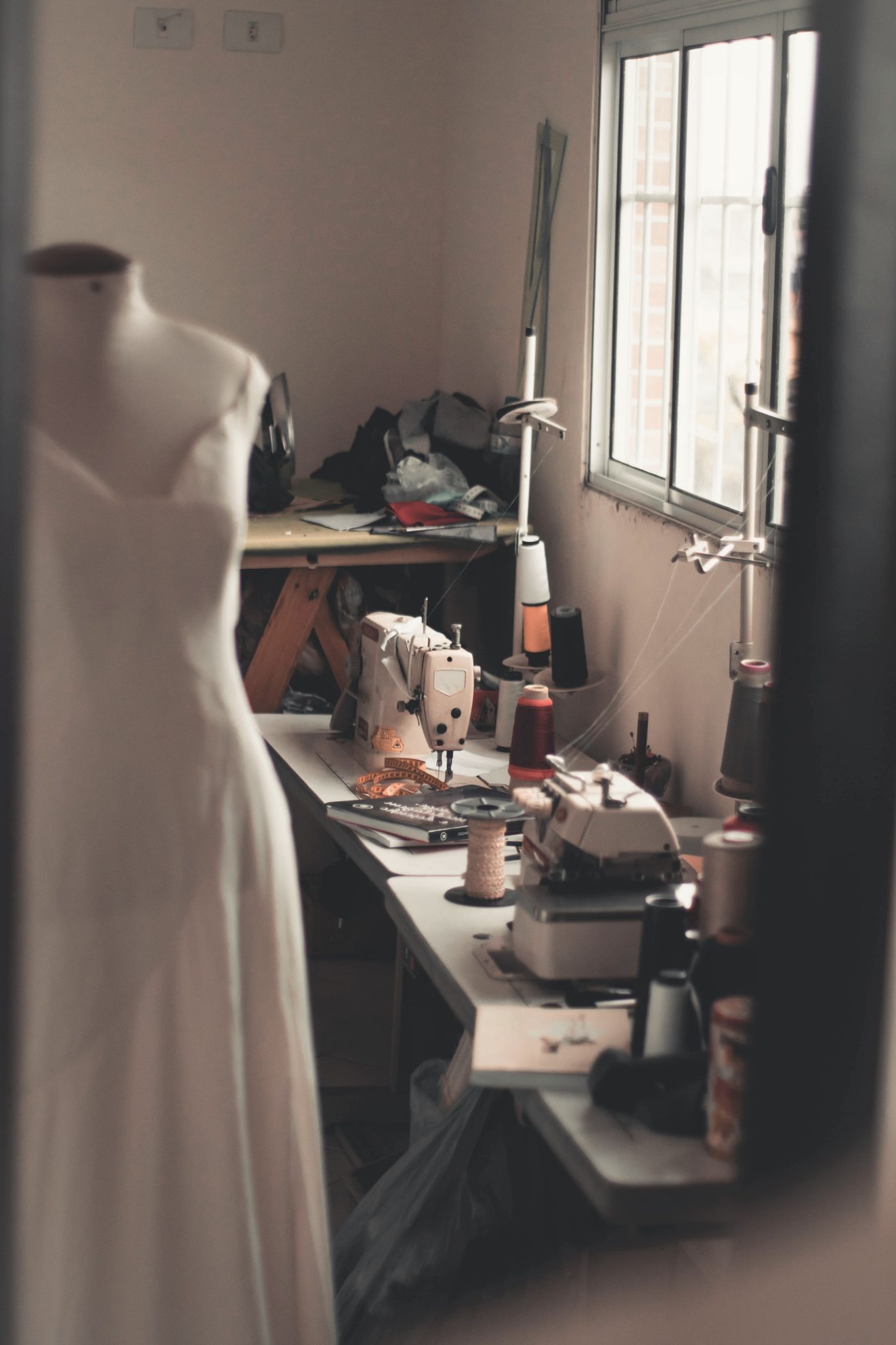 mannequin and sewing machine