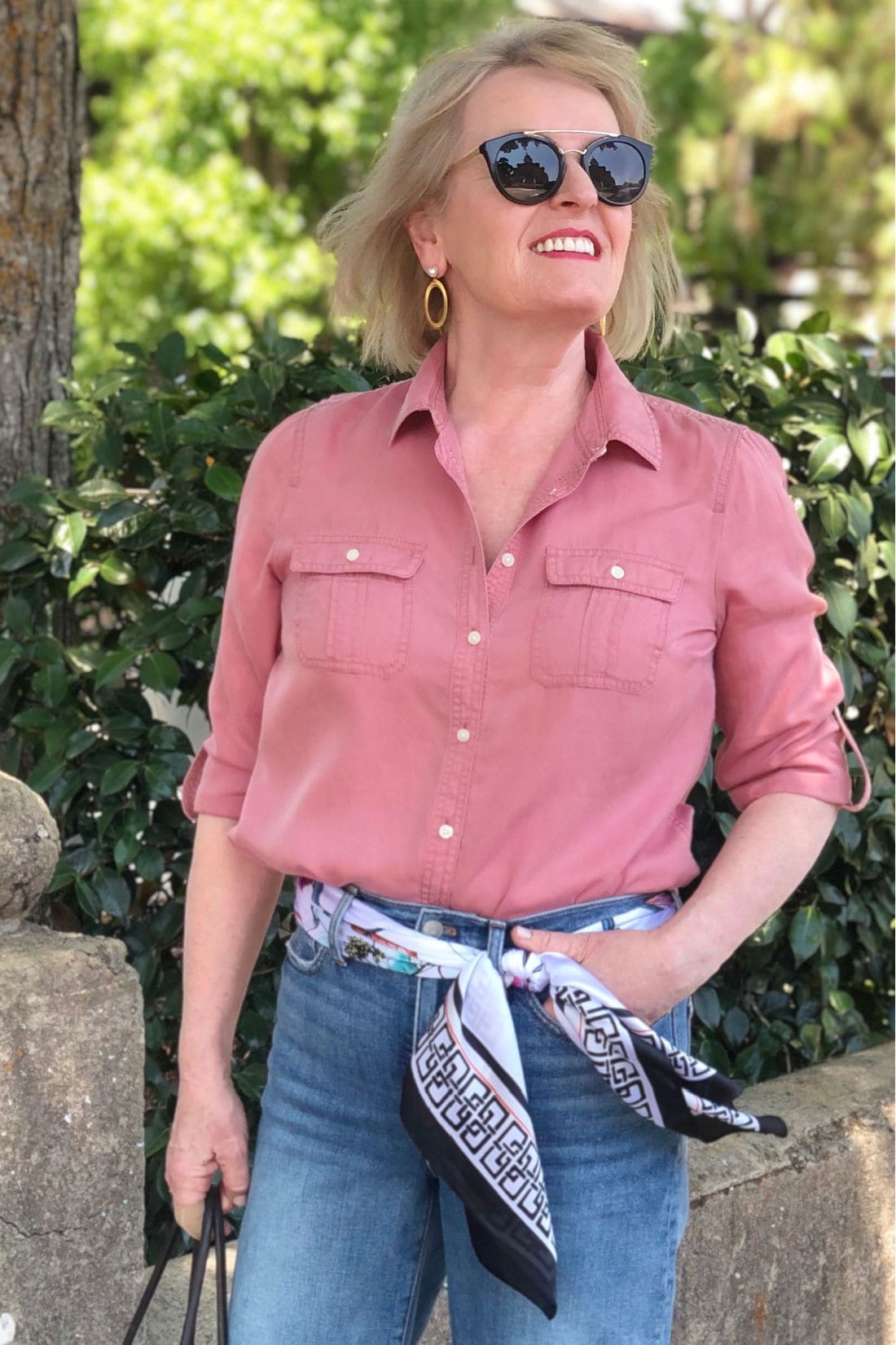 fashion blogger Jennifer Connolly wearing Dean Davidson Origami earrings