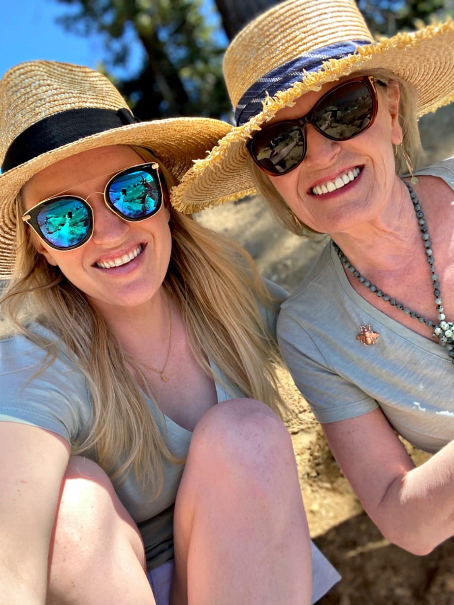 Jennifer and Vanessa Connolly wearing Madewell green tee and straw hats