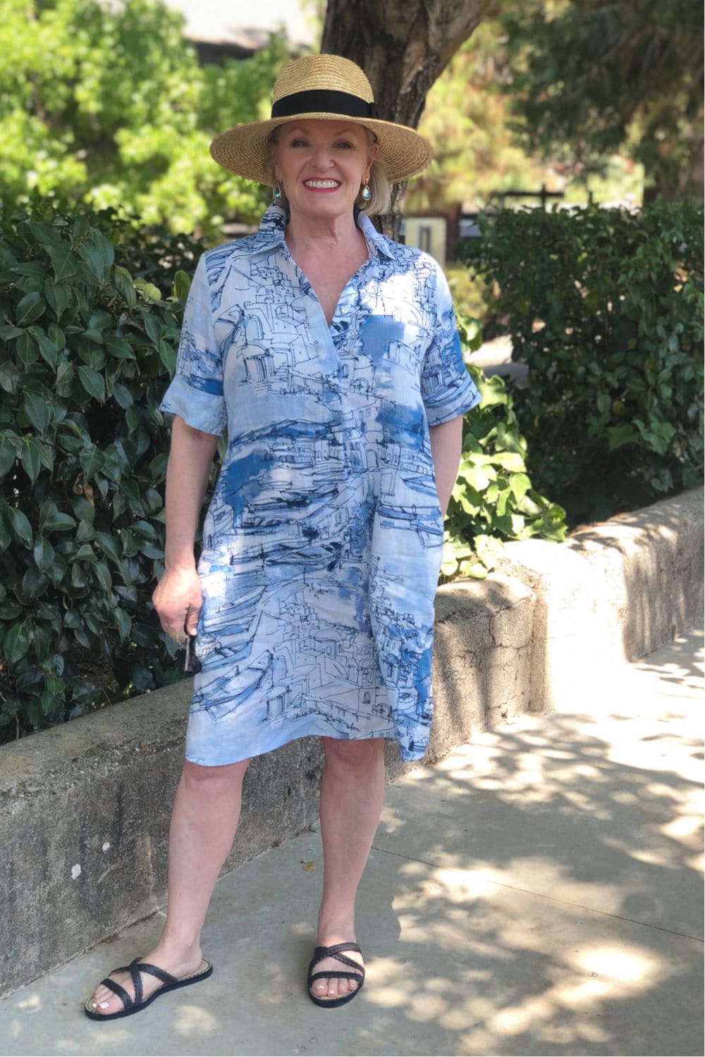 fashion blogger Jennifer Connolly wearing blue dress and Dean Davidson earrings