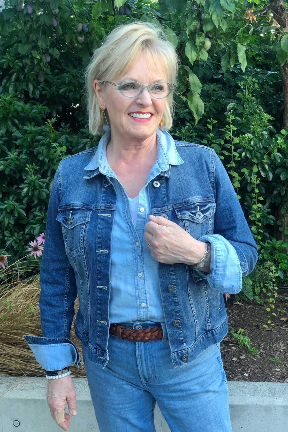 fashion blogger Jennifer Connolly wearing blue denim jacket and chambray shirt