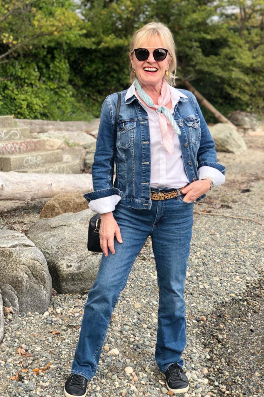 jennifer of a well styled life wearing double denim on the beach