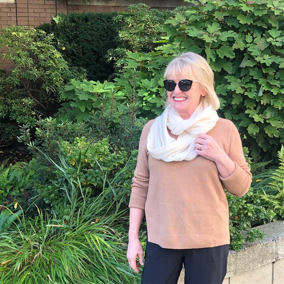 fashion blogger jennifer connolly of a well styled life wearing ahlogen cashmere scarf and camel colored sweater
