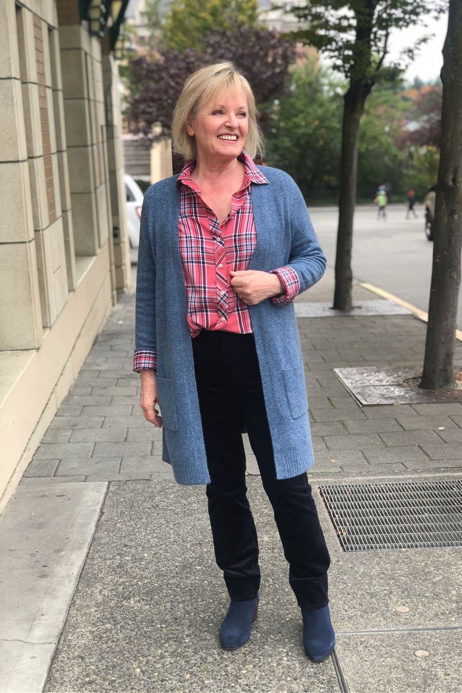jennifer of A Well Styled life wearing Talbots sweater and cords with boots