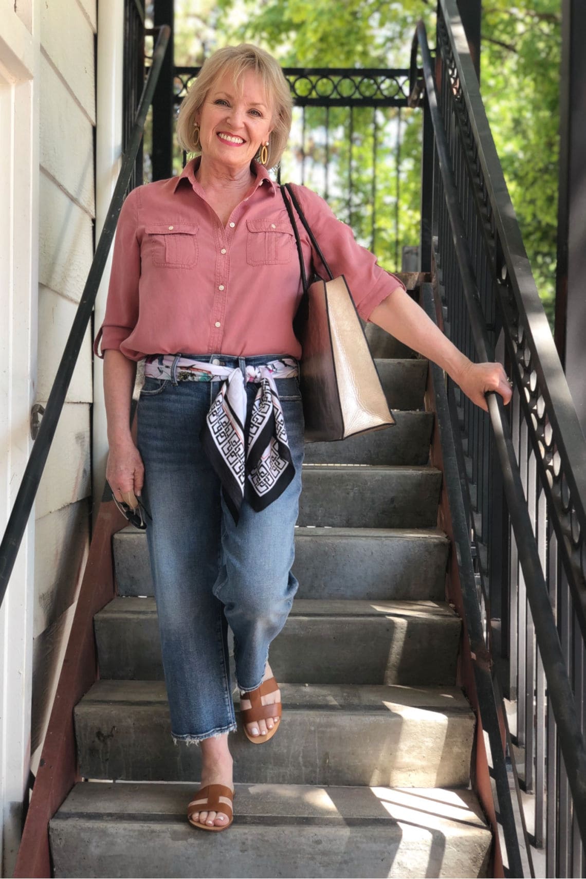jennifer Connolly of A Well Styled Life wearing pink bouse and youthful shape jeans