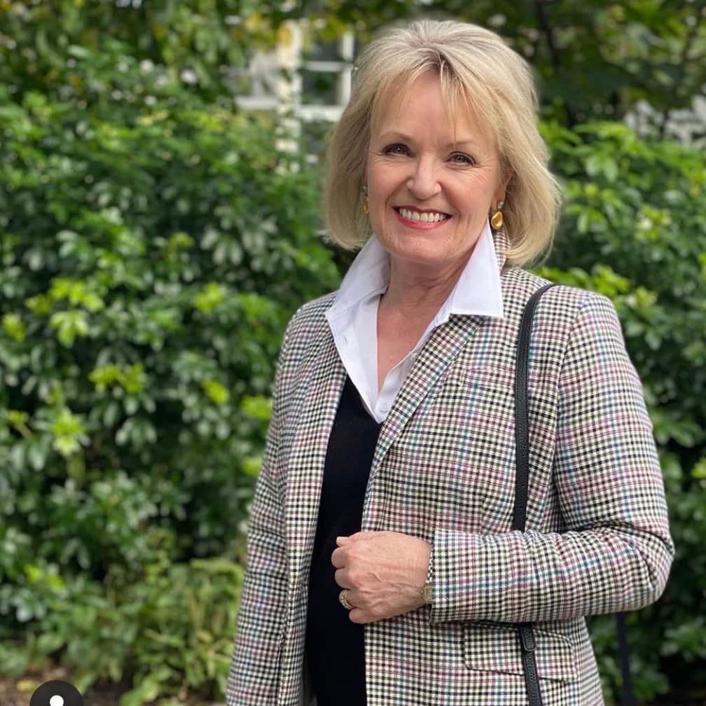 jennifer connolly wearing white shirt and tweed jacket