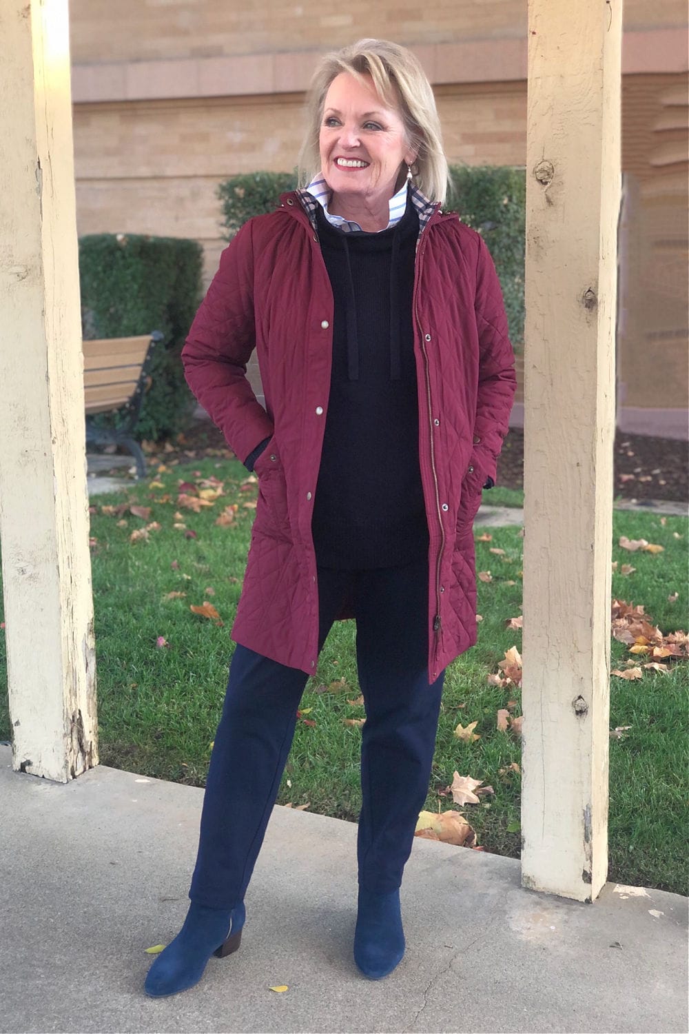 jennifer of a well styled like wearing Talbots long quilted coat over navy sweater and navy pants