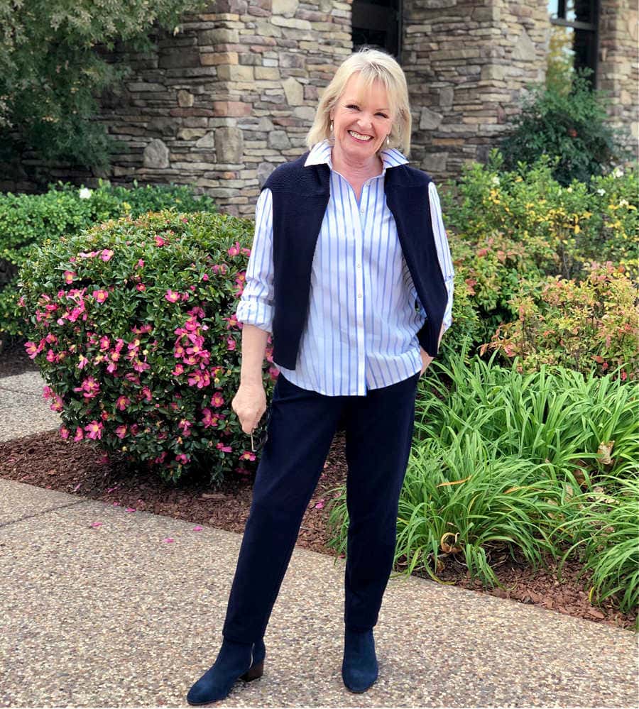 fashion blogger jennifer of a well styled life wearing talbots blue suede boots, navy sweater and navy T Talbots pants
