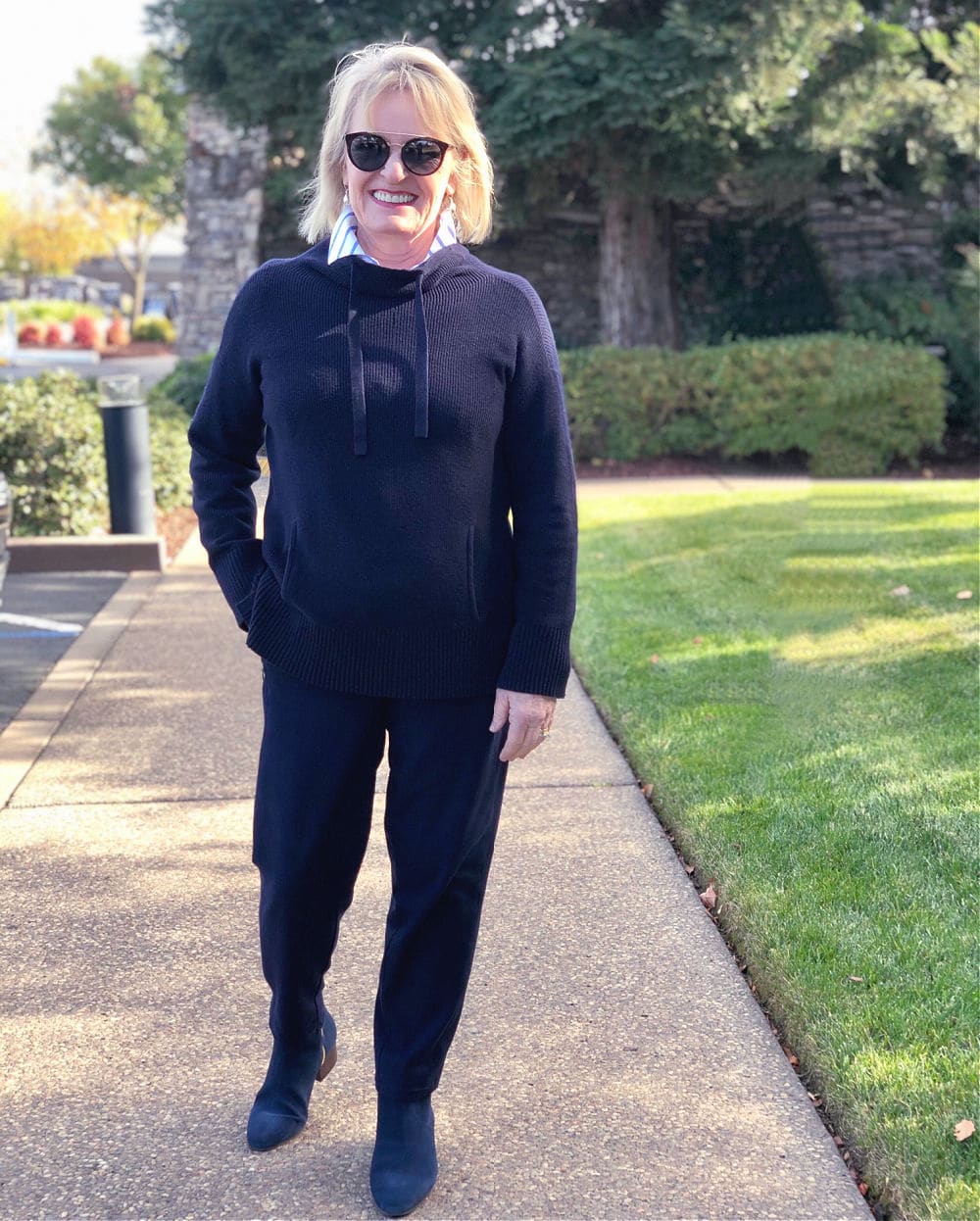 Jennifer connolly wearing Talbots fall outfit with navy sweater and pants