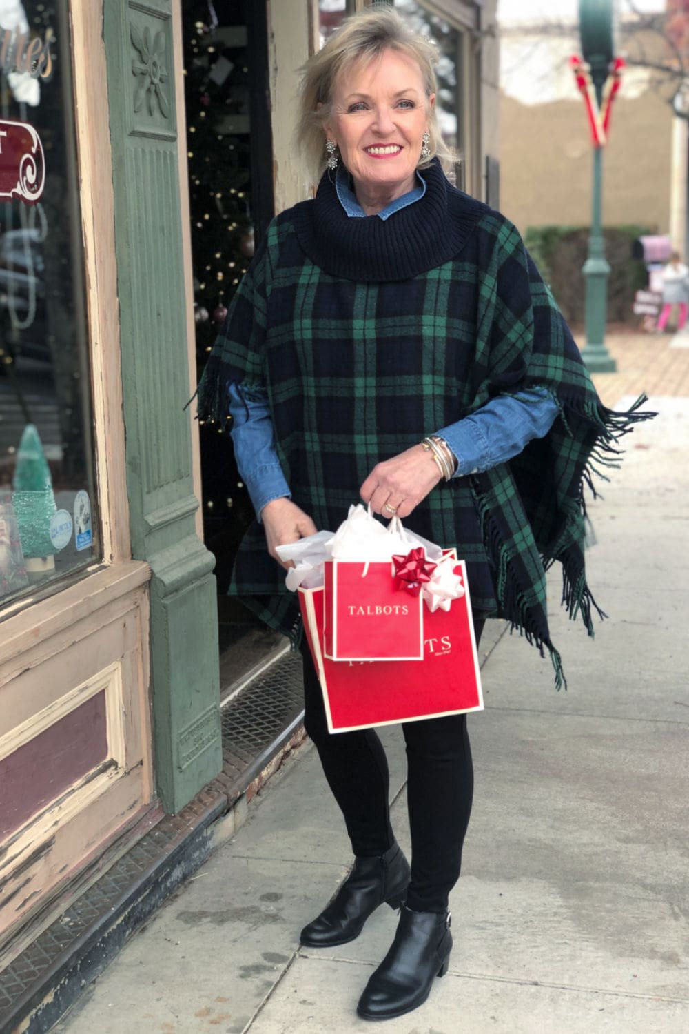 fashion blogger jennifer connolly of a well styled life wearing Talbots barely boots jeans with blackwatch plaid poncho