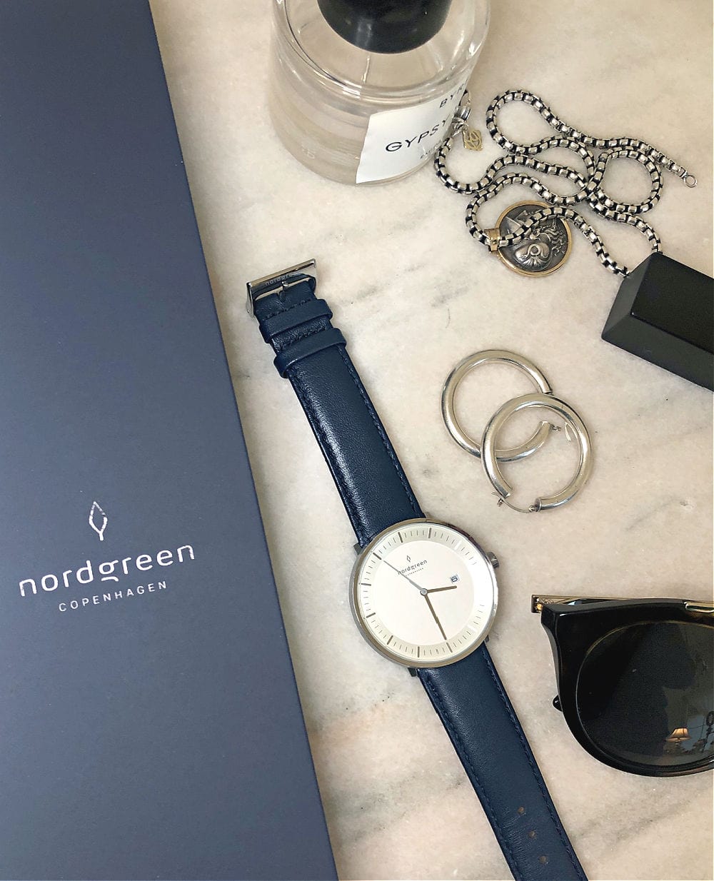 flat lay witrh nordgreen watch
