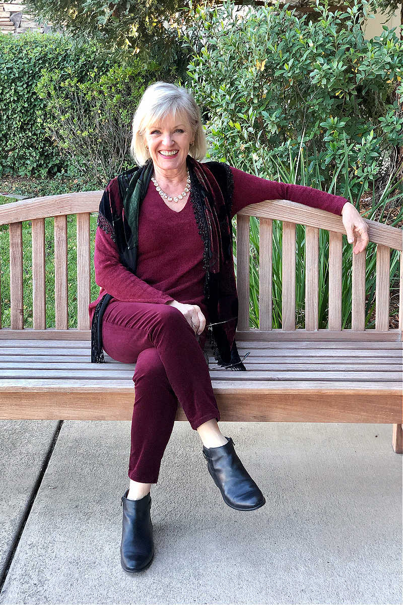 jennifer connolly wearingcasual at-home holiday outfit of j jill burgundy sweater and cords
