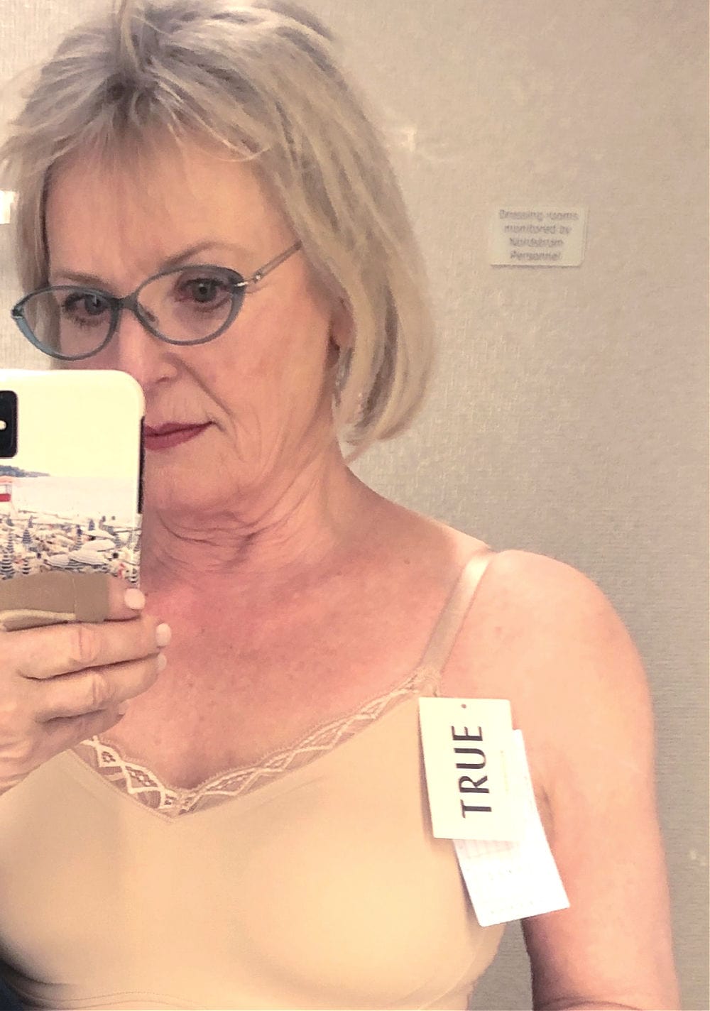 over 50 fashion blogger jennifer connolly of a well styled life wearing True wireless bra in Nordstrom dressing room
