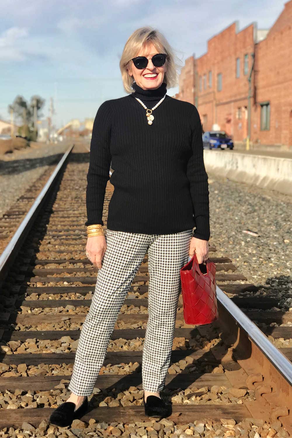 fashion blogger jennifer of a well styled life wearign chicos turtleneck and juliet pant
