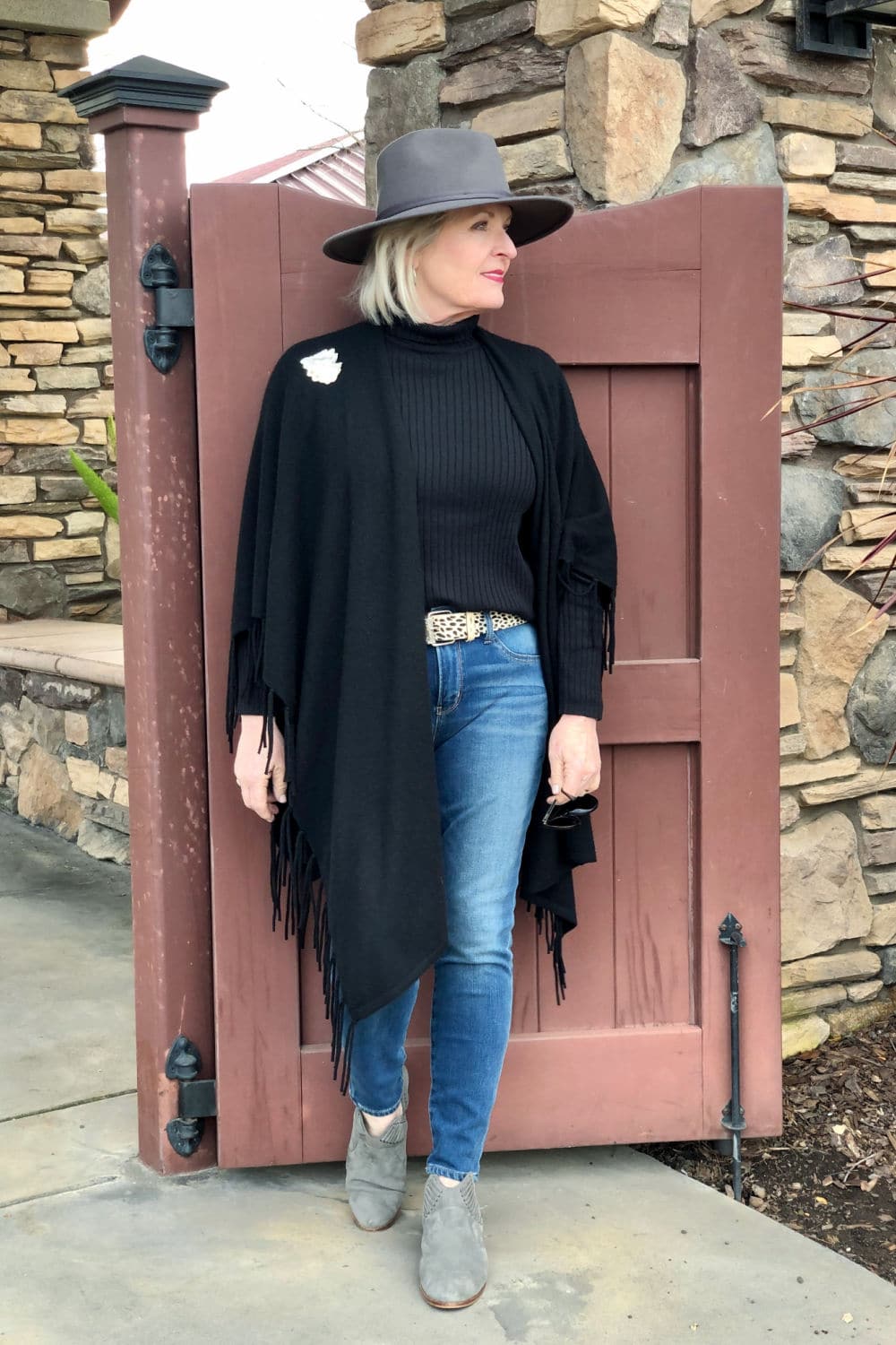 chico's black wrap trend with blue jeans on jennifer of a well styled life