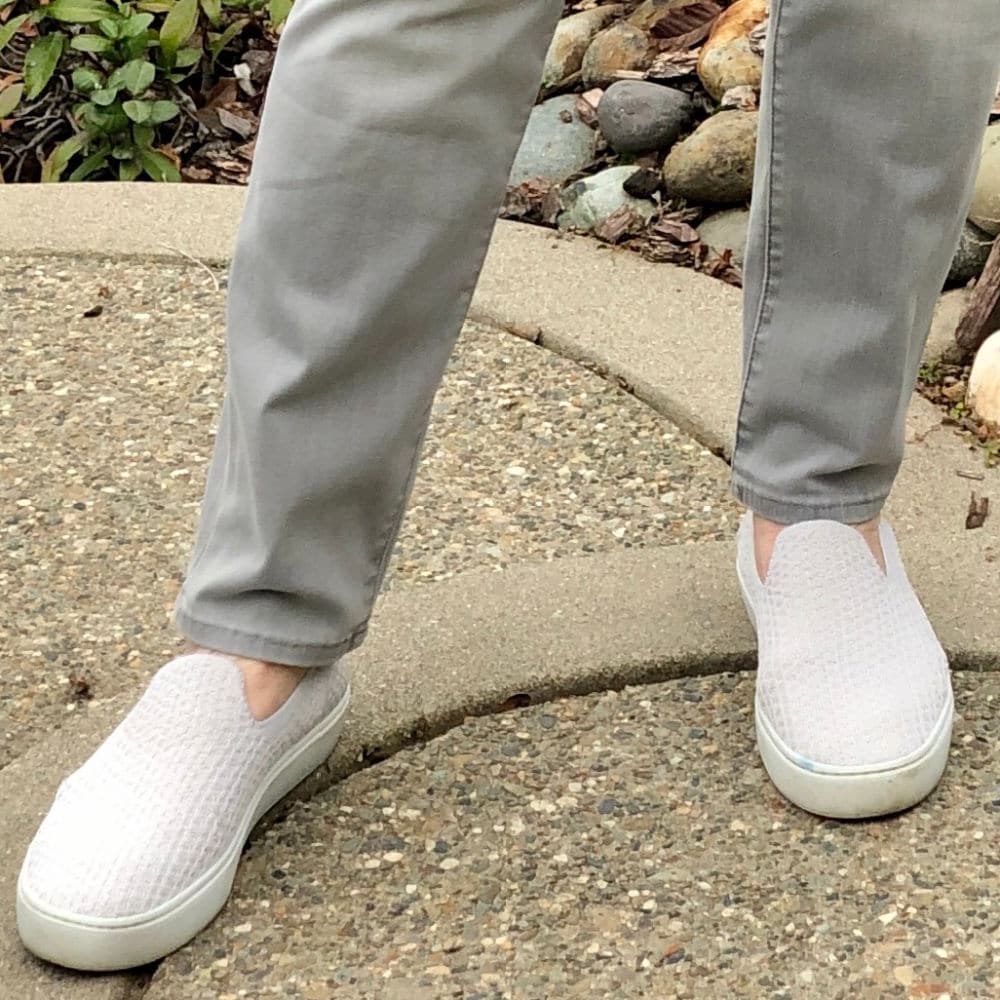 pale gray rothys sneakers on a well styled life