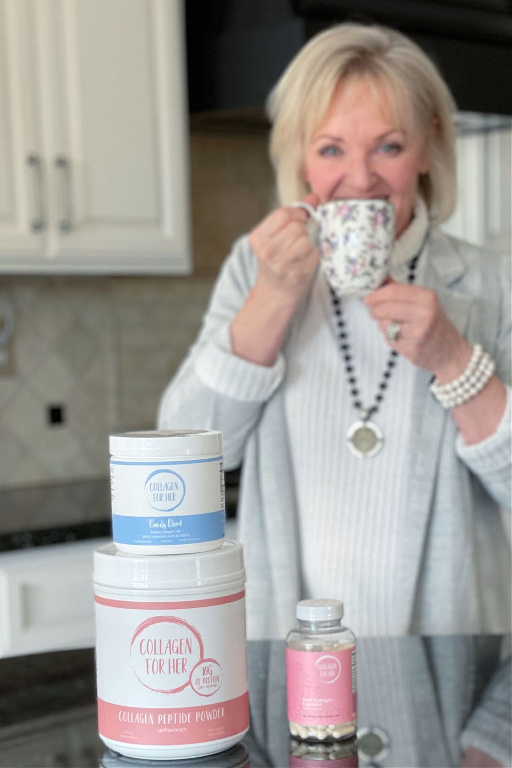 over 50 blogger jennifer connolly of a well styled life drinking tea with collagen powder added