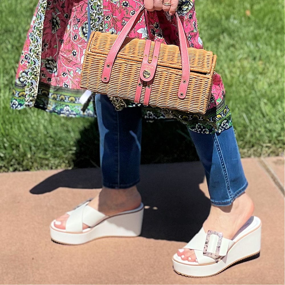 straw handbag and wedge sandals with blue jeans and kimono