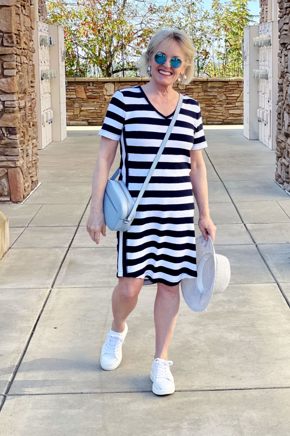 fashion blogger jennifer connolly of a well styled life wearing blue and white athleisure dress