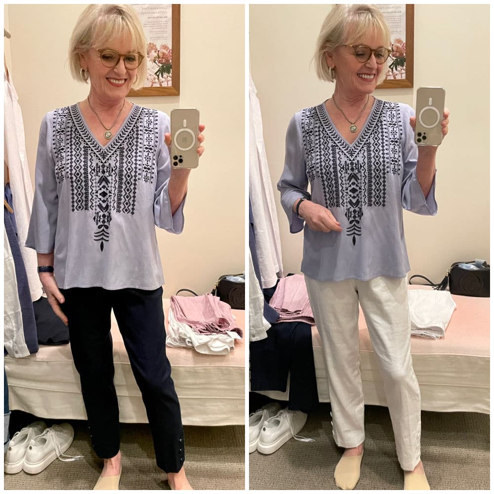 blonde woman wearing tunic with white pants and also with navy pants