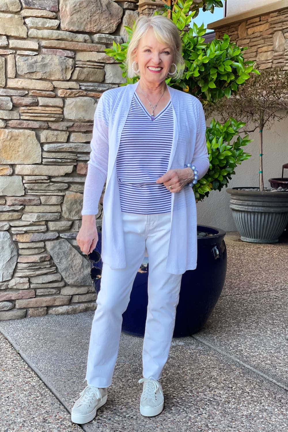 jennifer of a well styled life wearing vineyard vines strioed tee and white jeans from madewell