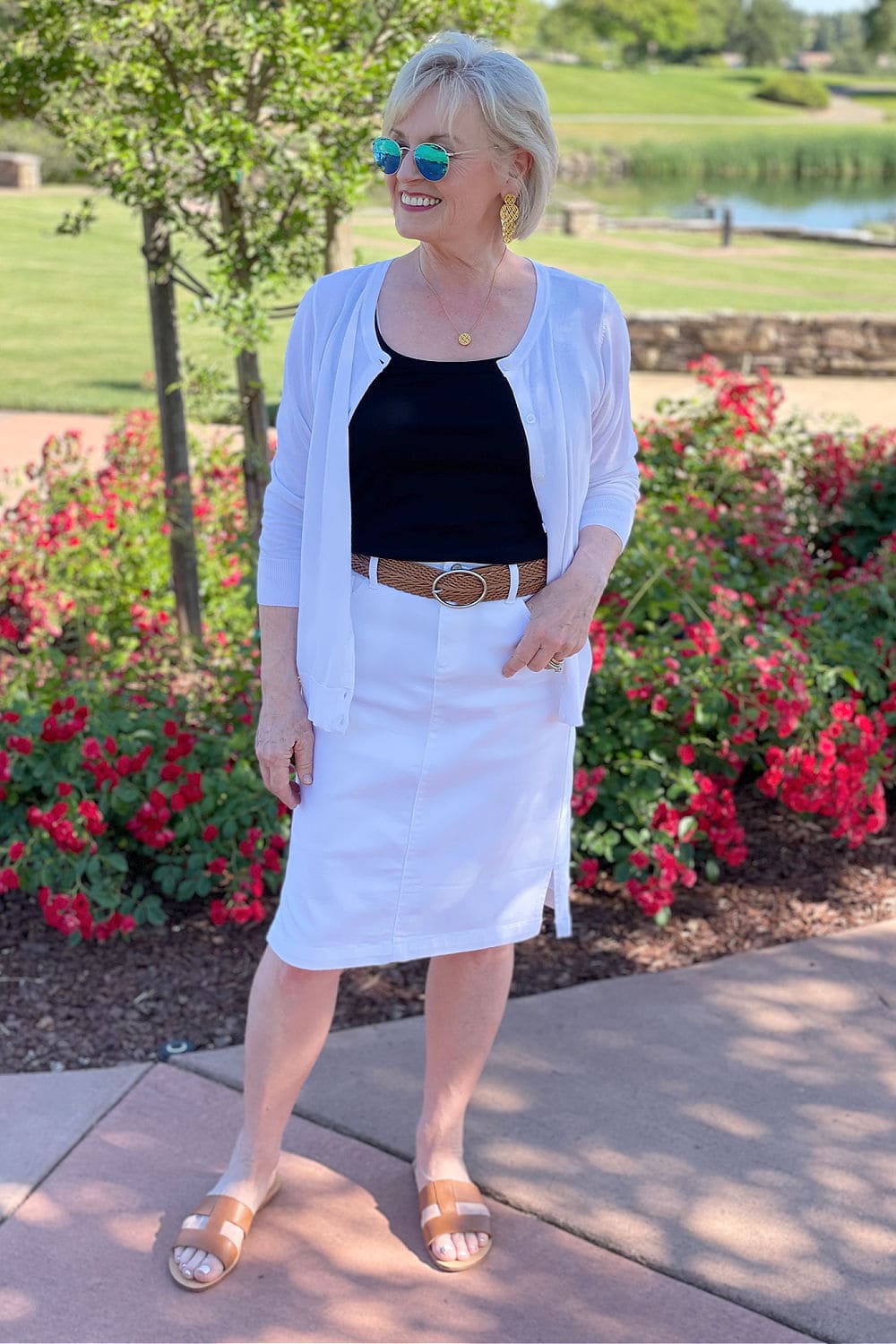 jennifer of a well style life wearign chico's white denim skirt and talbots sandals