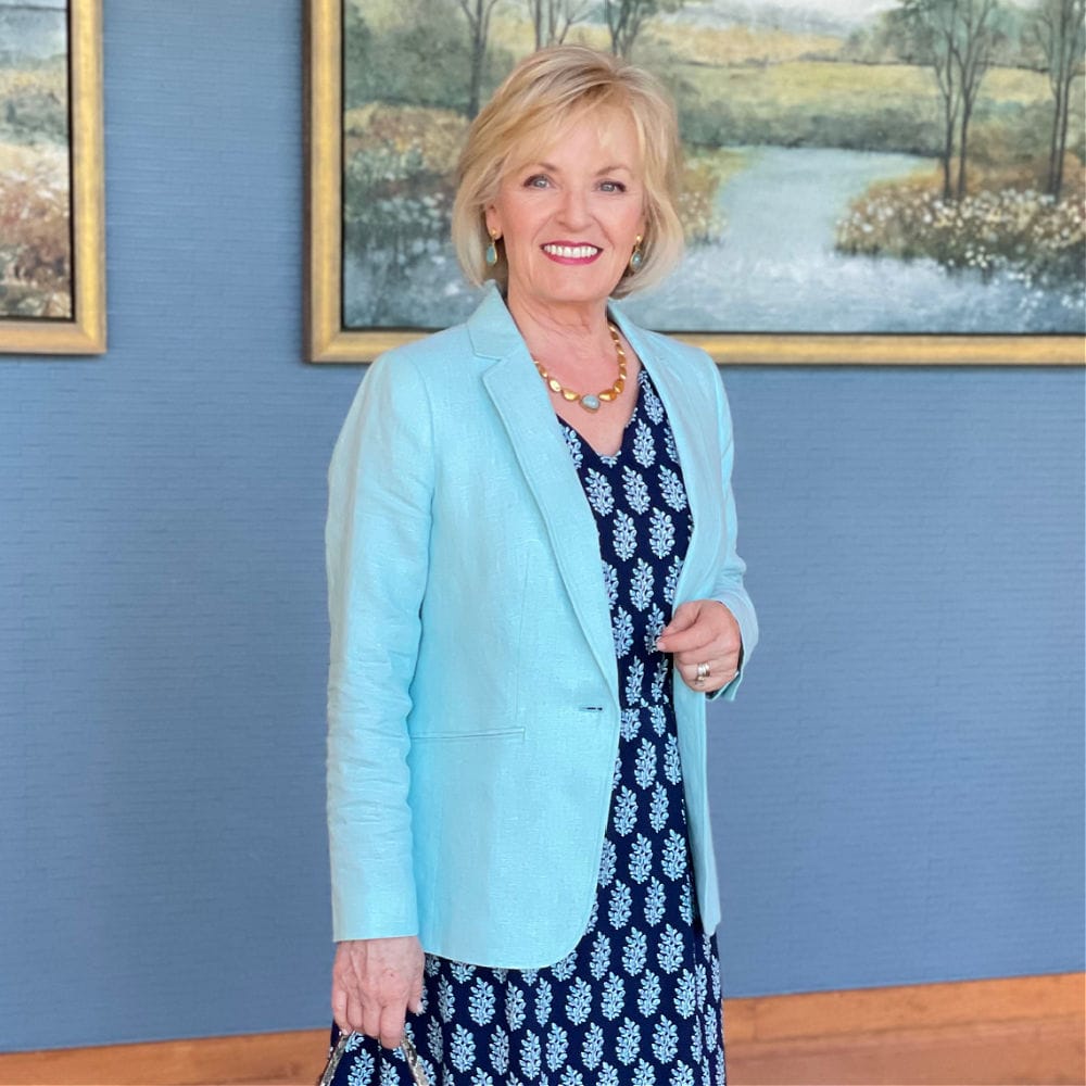 over 50 blooger showing how to dress up a casual cotton maxi dress