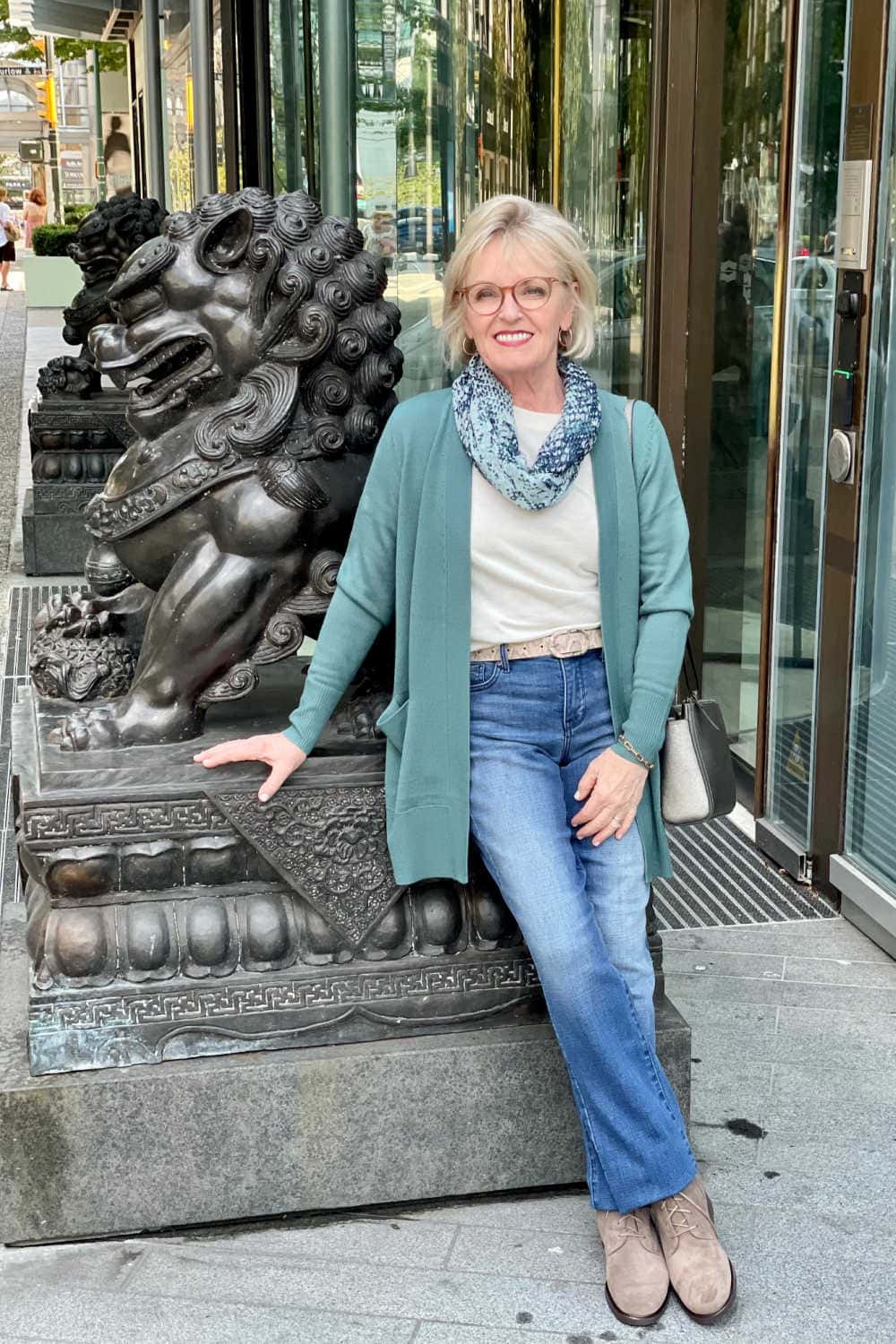 woman wearing sweater and denim from the nsale