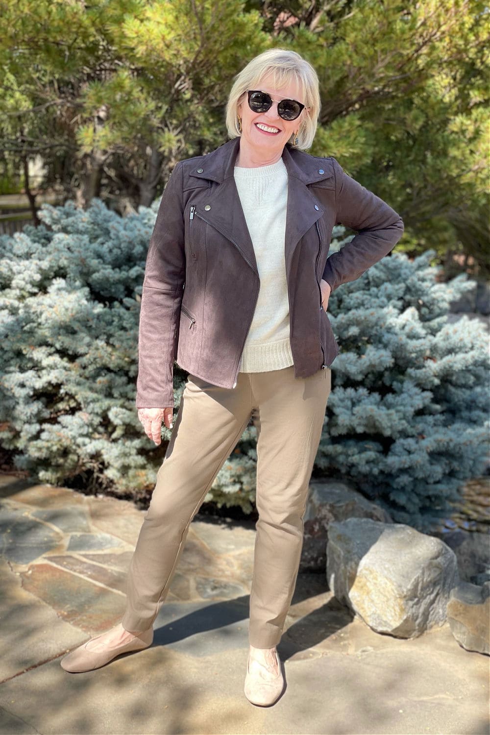 ovee 50 fashion blogger wearing brown faux suede jacket and beige sweater
