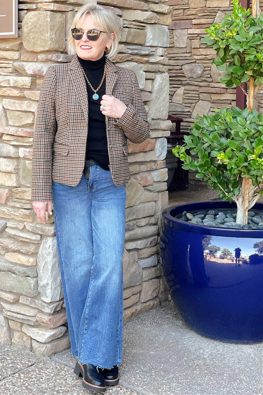over 50 fahsion blogger jennifer connolly of a well styled life wearing trendy wide jeans and loafers