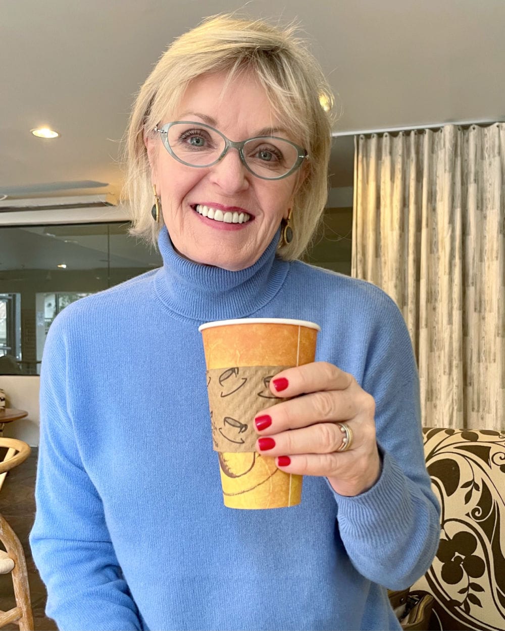 blond woman drinking tea