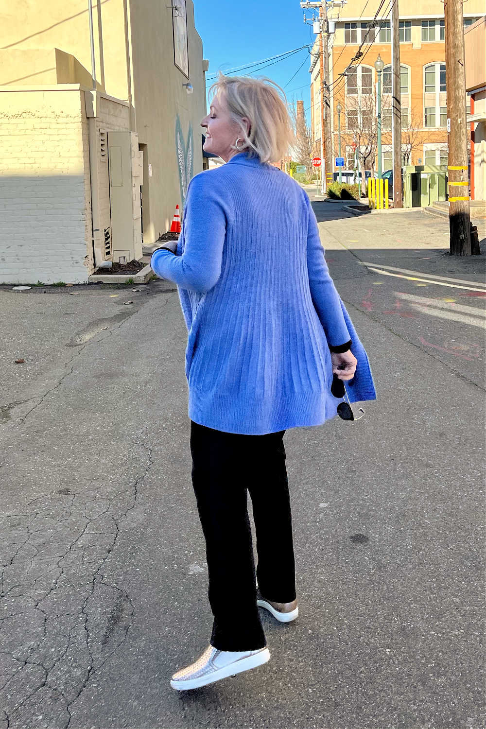 BACK OF BLUE CARDIGAN