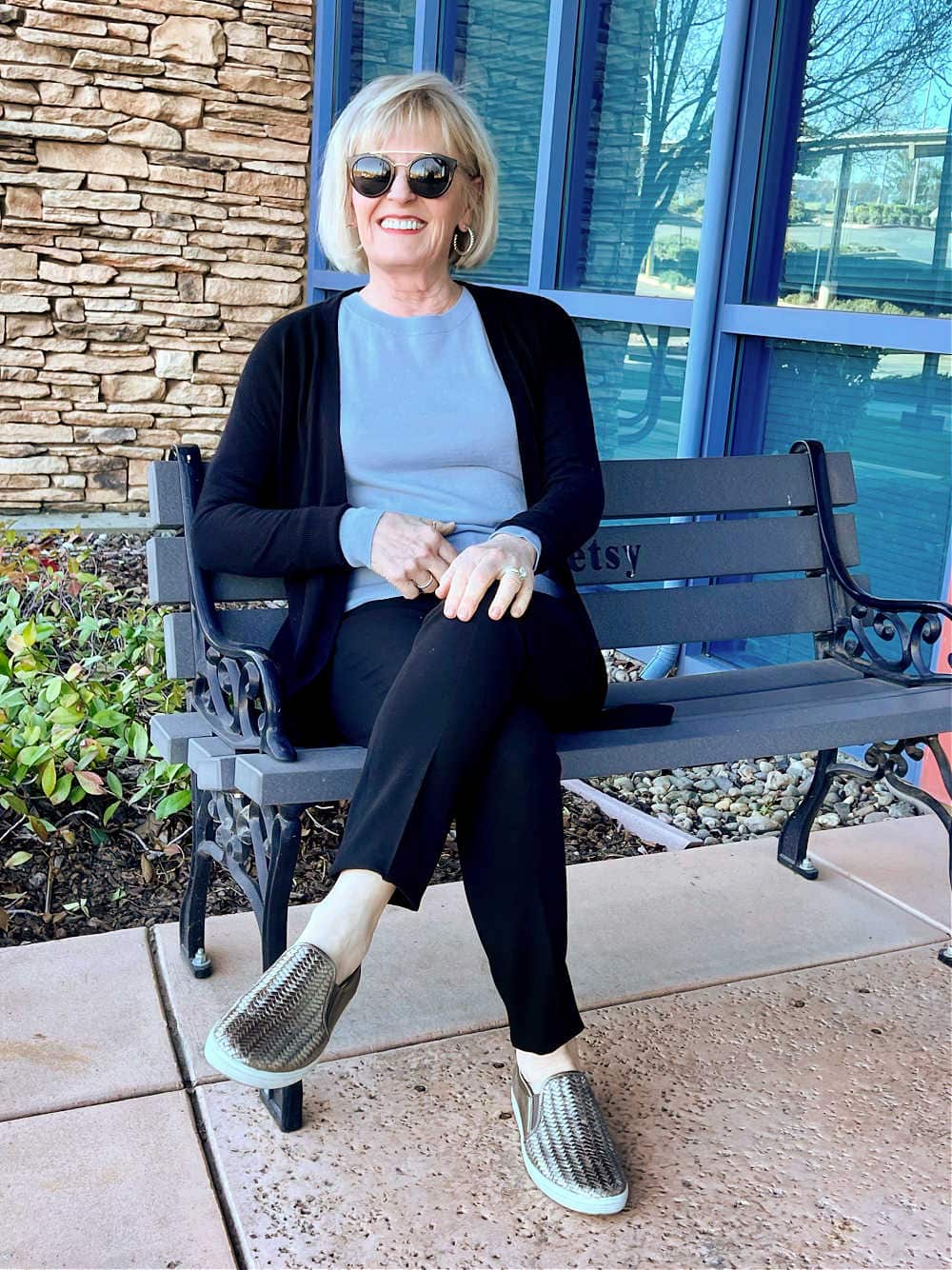woman sitting on bench