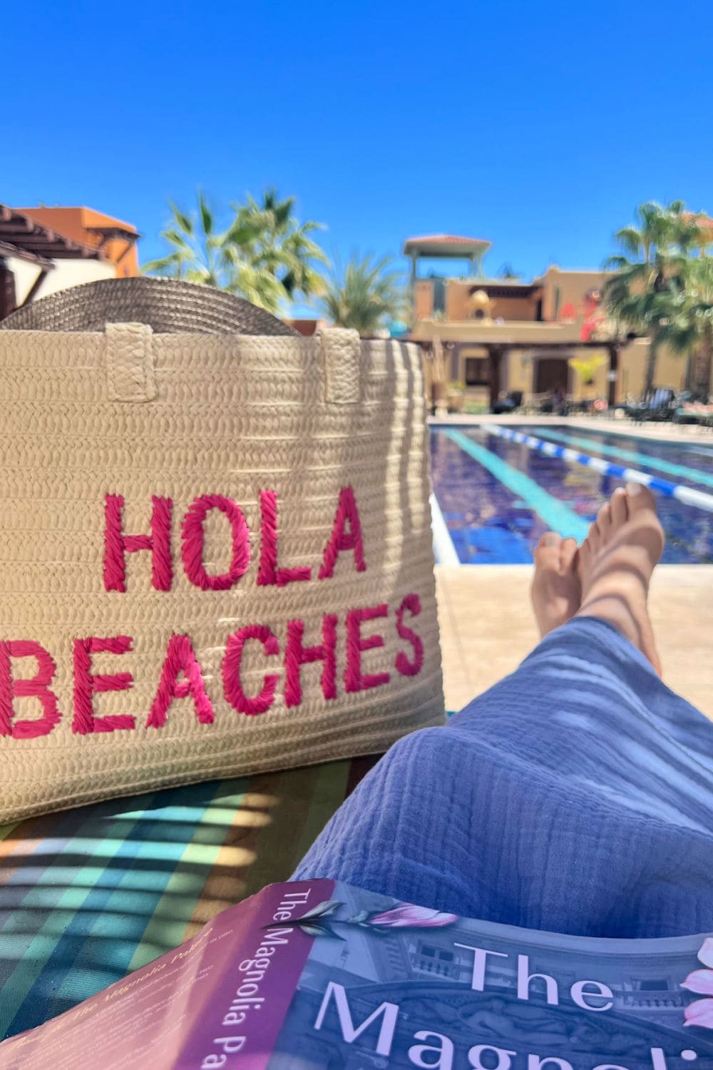 hola beaches tote bag at pool