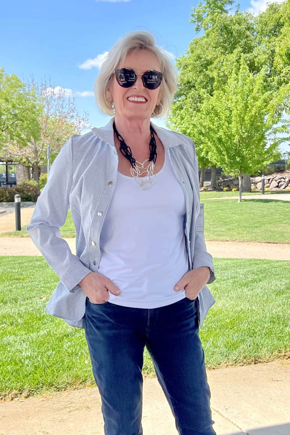 woman wearing jacket and jeans