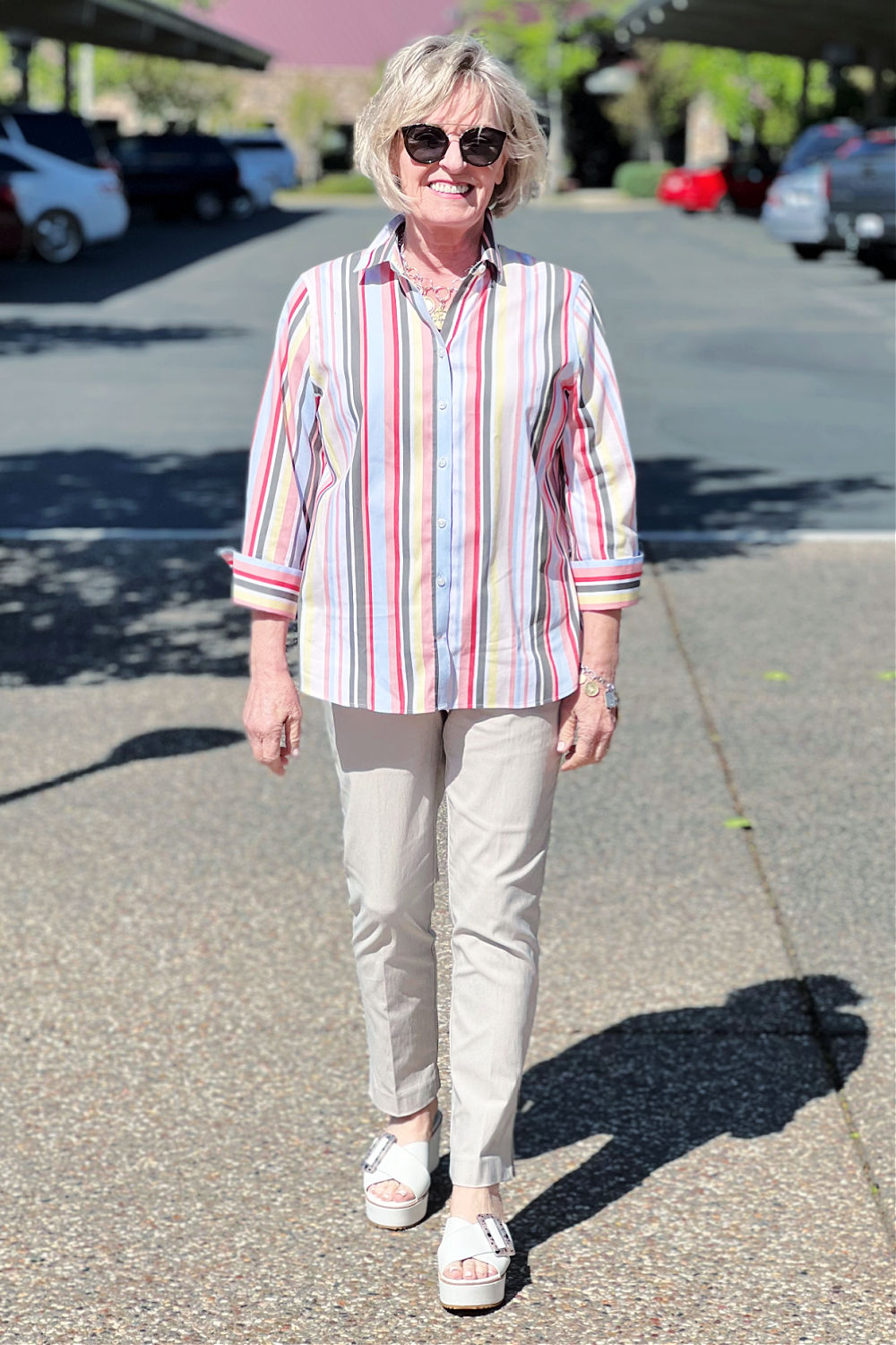 woman wearing chicos new brigette 360 pants with striped shirt