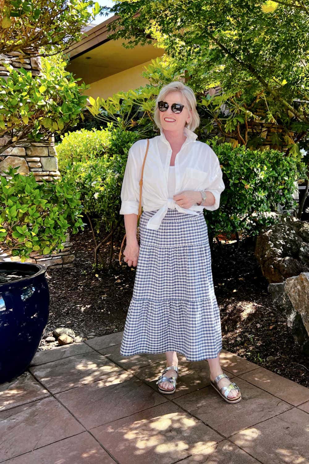 woman wearing target gingham skirt and white shirt