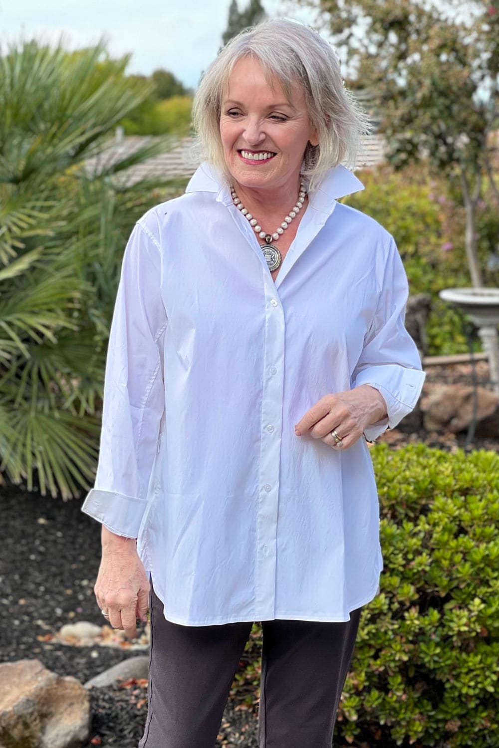 jennifer connolly of a well styled life wearing athleta white oversized poplin shirt