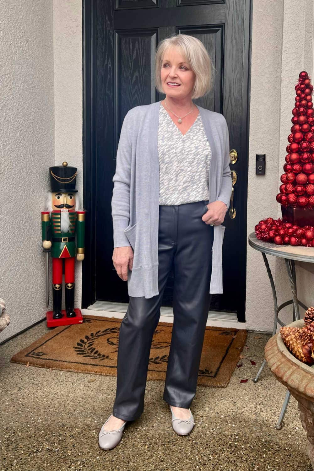 soft gray print blouse with gray faux leather pants