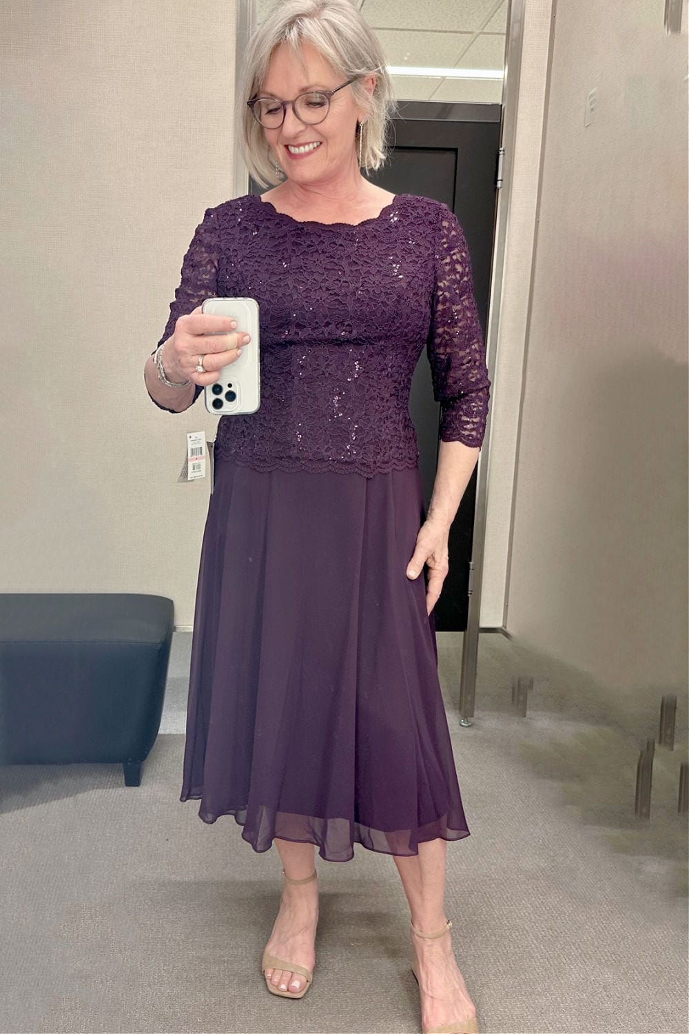 woman modeling Alex Evenings mock two piece cocktail dress for special occaision