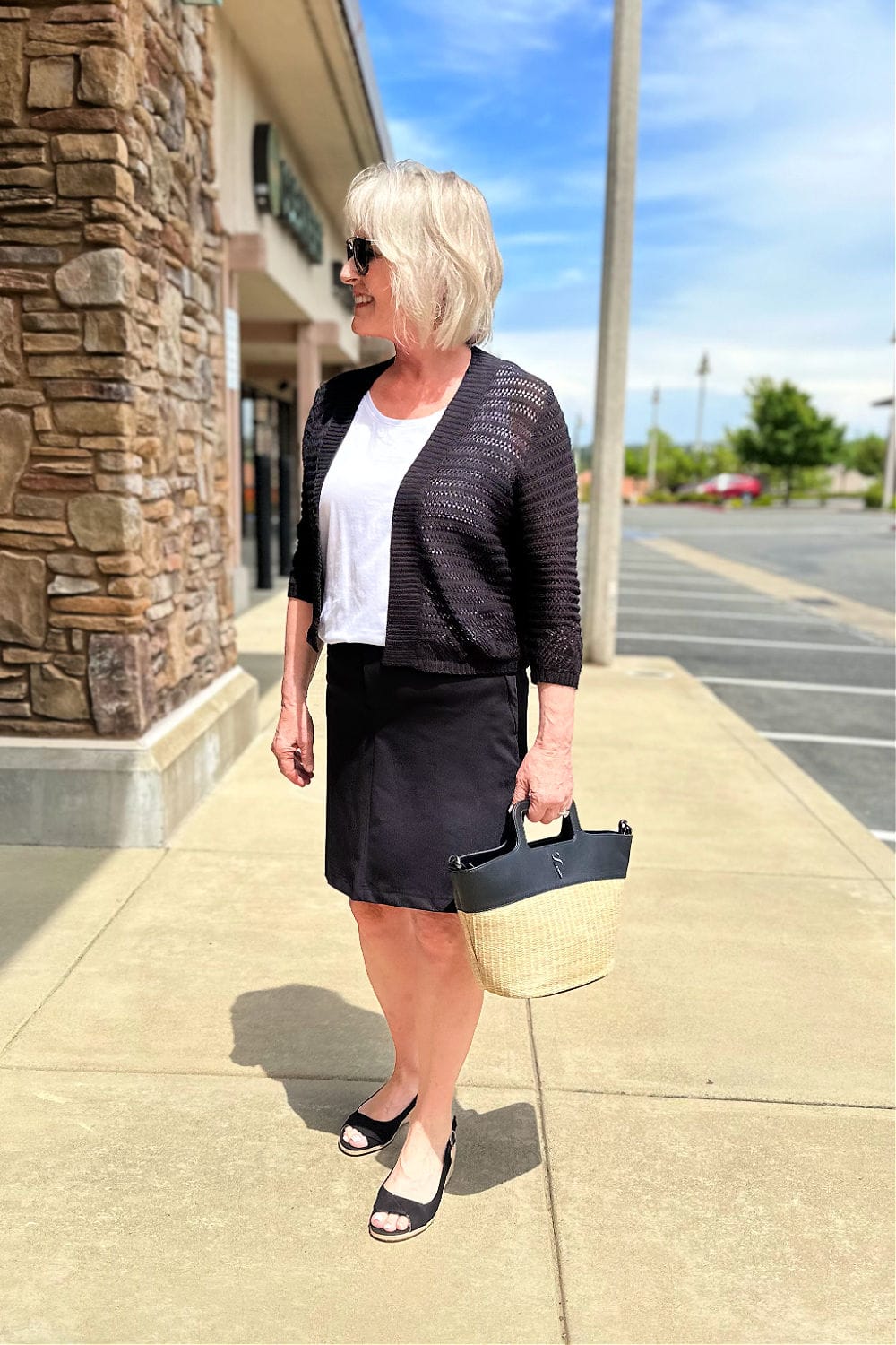 black and neutral skort outfit on woman over 50
